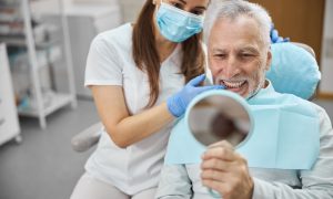 How to Know if a Dental Implant is Infected? Symptoms and Warning Signs